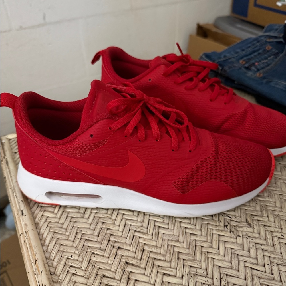 Red and white Nikes 10.5
